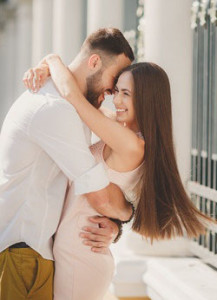 an attractive couple embracing